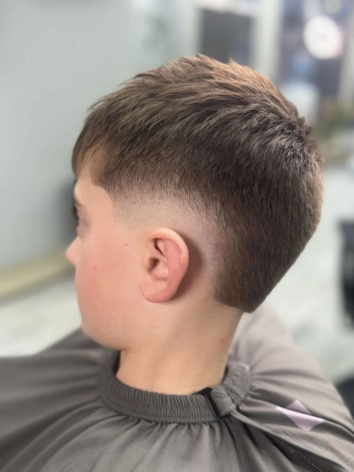 Brushed-forward crop with a low taper fade