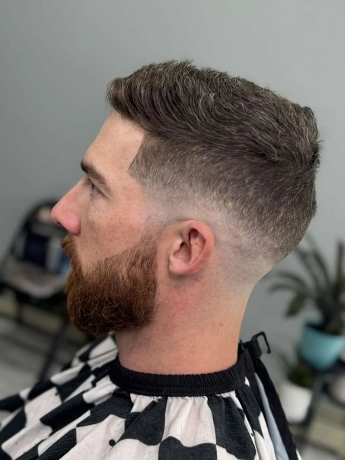Short textured crop with a skin fade and full beard