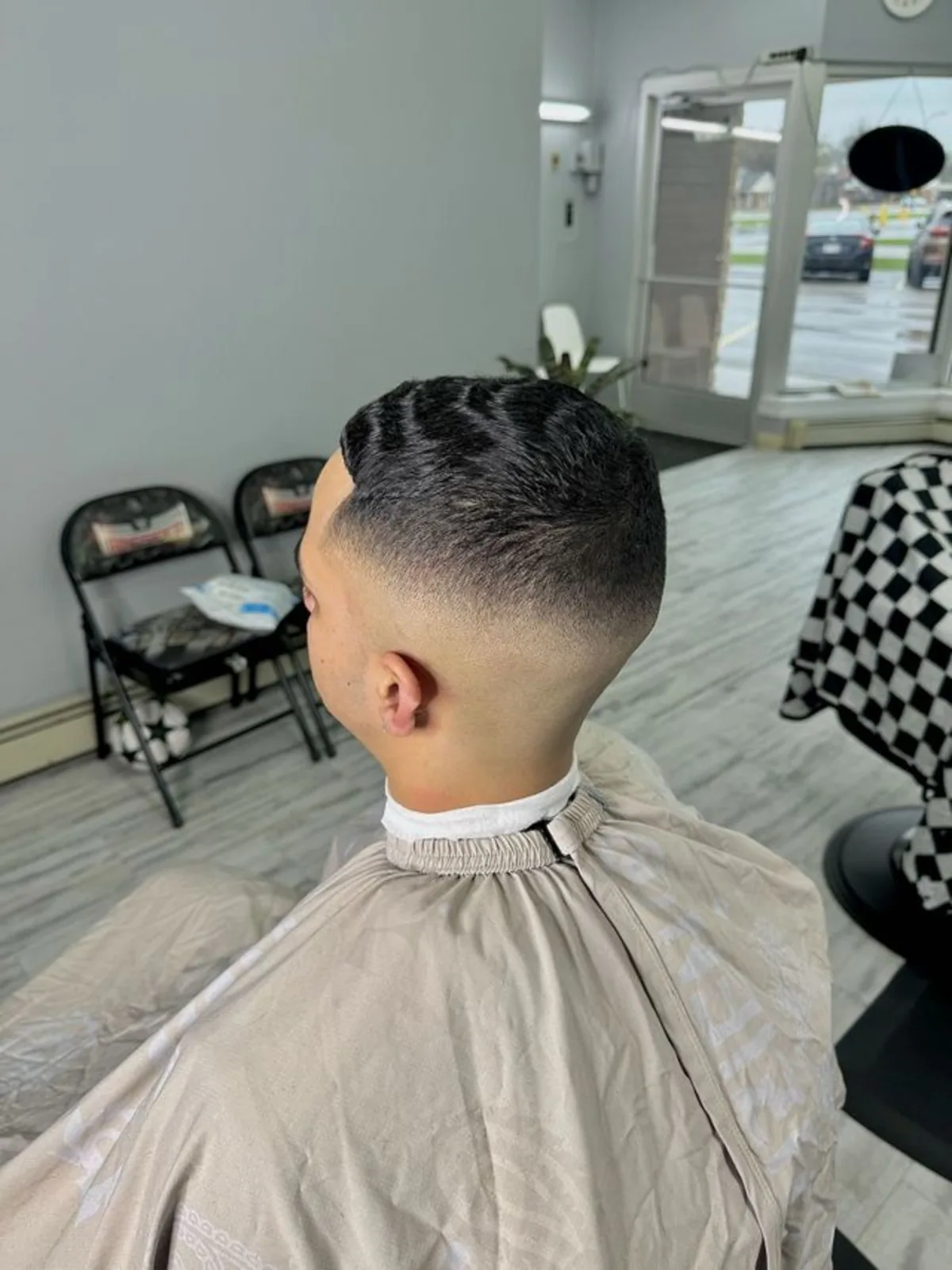 Kids short crop with a high skin fade and lineup