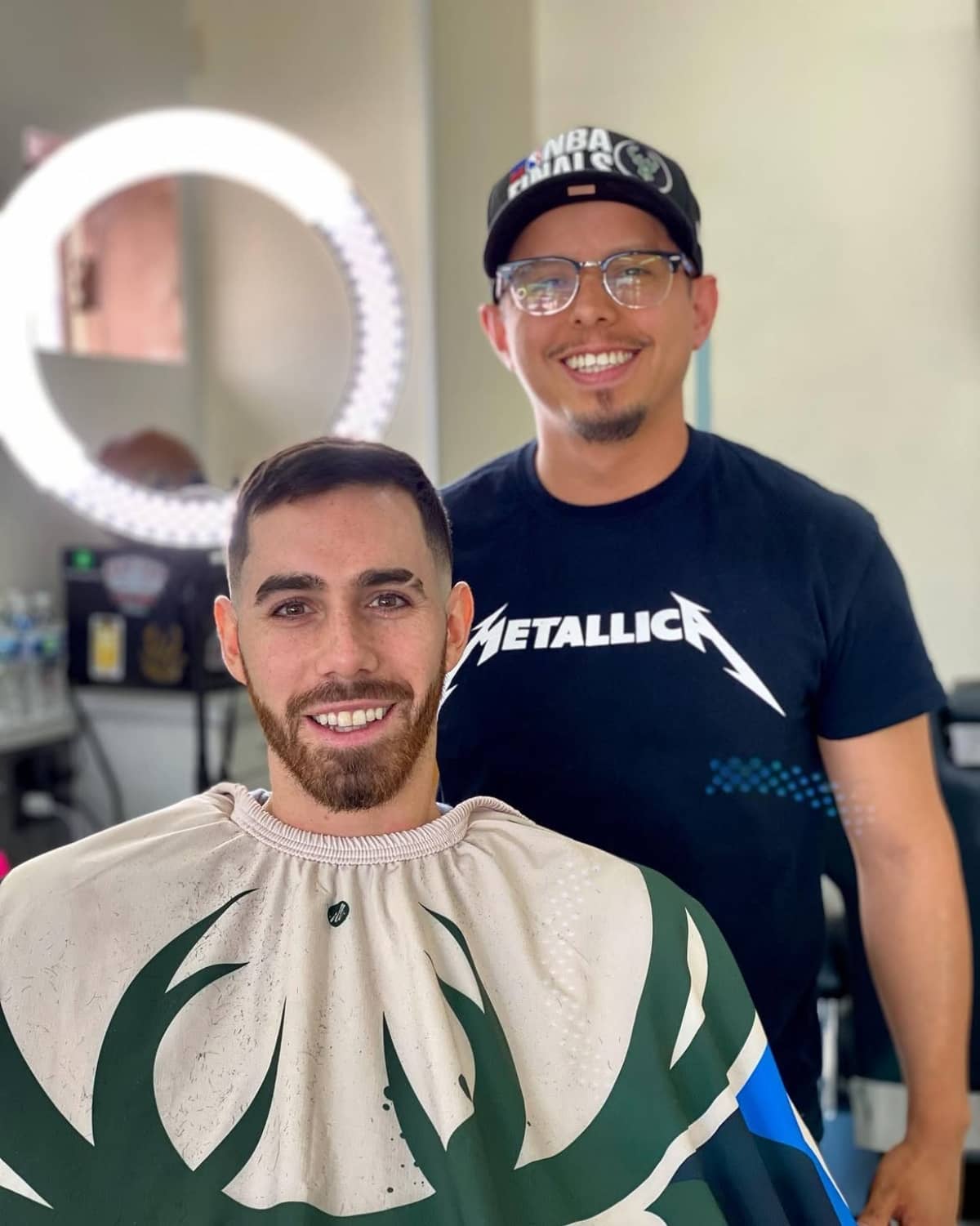 JJ, owner and barber
